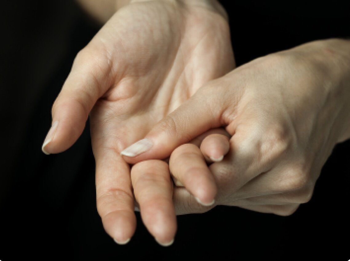 Hands gently resting together - representing the gentle, accessible nature of PianoProse